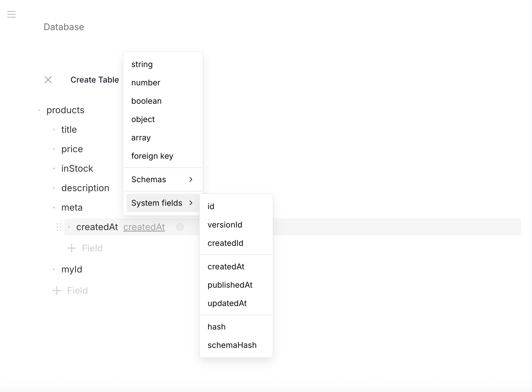 Schema Editor — System fields submenu with id, versionId, createdId, createdAt, publishedAt, updatedAt, hash, schemaHash